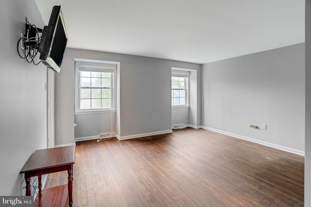 755 Shawmont Ave, Philadelphia, PA 19128 - unfurnished room with wood finished floors and baseboards