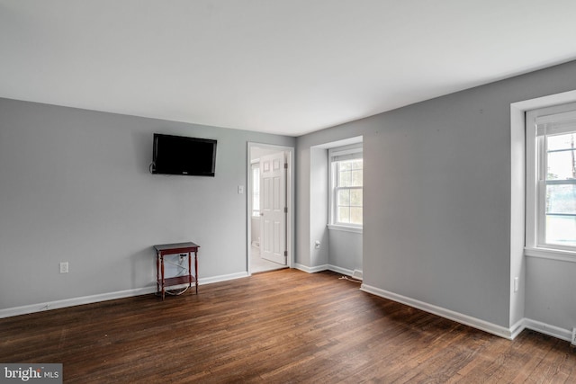 755 Shawmont Ave, Philadelphia, PA 19128 - unfurnished living room featuring wood finished floors and baseboards