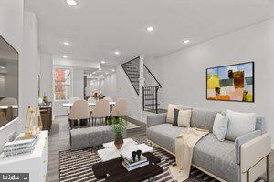 living room with stairway and recessed lighting