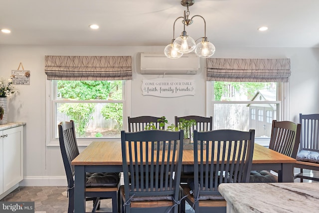 111 Linden Ave, Pasadena, MD 21122 - dining room featuring recessed lighting, stone finish flooring, baseboards, and a wall mounted AC
