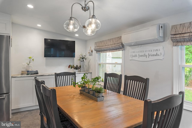 111 Linden Ave, Pasadena, MD 21122 - dining area featuring recessed lighting, a wall unit AC, and stone finish flooring