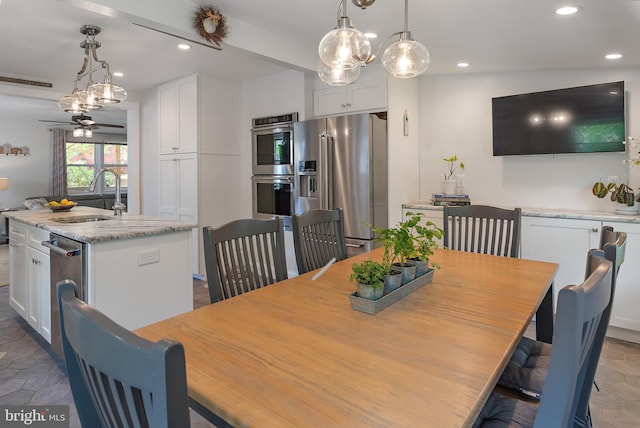 111 Linden Ave, Pasadena, MD 21122 - dining space featuring recessed lighting and a notable chandelier