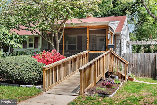 111 Linden Ave, Pasadena, MD 21122 - exterior space with a sunroom, fence, and stairs