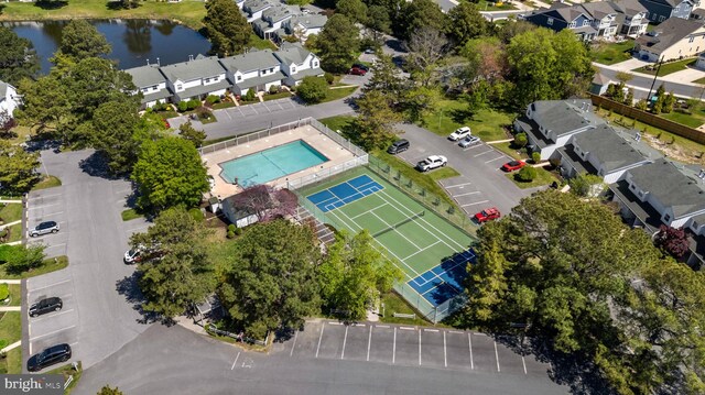 aerial view featuring a residential view and a water view