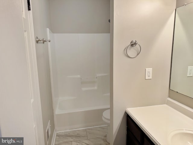 full bathroom featuring vanity, bathtub / shower combination, toilet, and marble finish floor