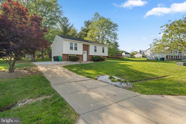 3604 Ripplingbrook Ct, Bowie, MD 20721 - split foyer home with brick siding, driveway, and a front yard