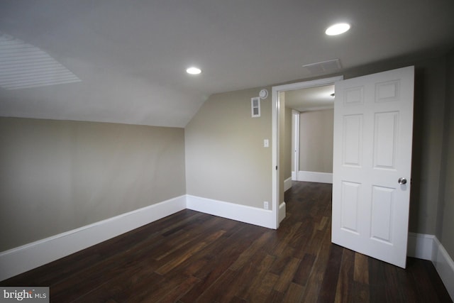 bonus room featuring baseboards, dark wood-style flooring, visible vents, and recessed lighting