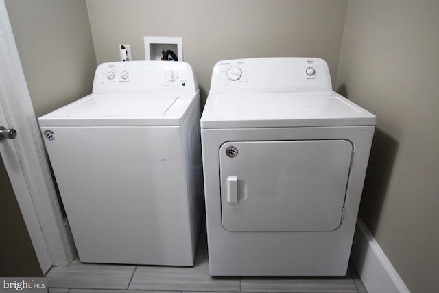 laundry room featuring laundry area and independent washer and dryer