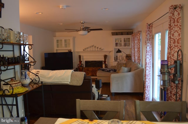 5849 Colfax Ave, Alexandria, VA 22311 - living room featuring wood finished floors, a ceiling fan, a fireplace, and recessed lighting