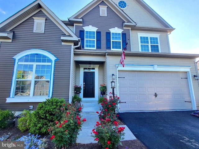 109 Manila Pl, Stephenson, VA 22656 - view of front of house with a garage and driveway