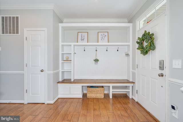 109 Manila Pl, Stephenson, VA 22656 - mudroom featuring light wood-style flooring, ornamental molding, built in study area, and baseboards