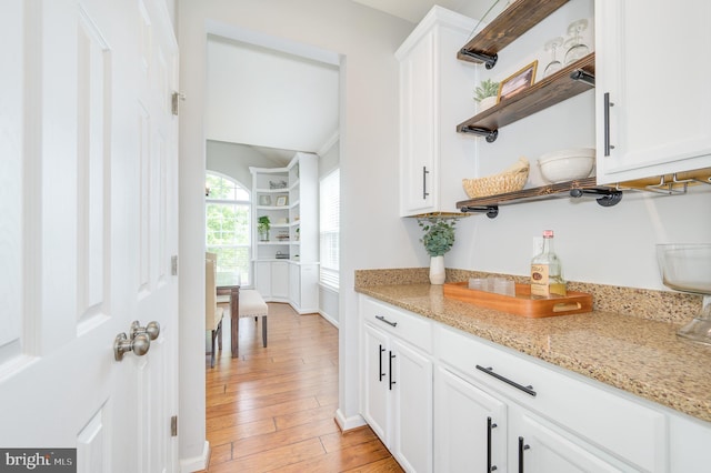 109 Manila Pl, Stephenson, VA 22656 - bar with light wood-style floors and baseboards