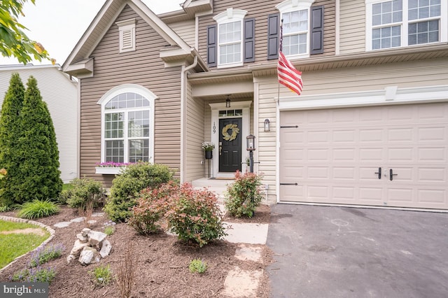 109 Manila Pl, Stephenson, VA 22656 - view of front of house featuring an attached garage and driveway