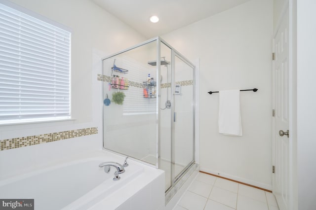 109 Manila Pl, Stephenson, VA 22656 - bathroom with a bath, a shower stall, and tile patterned flooring