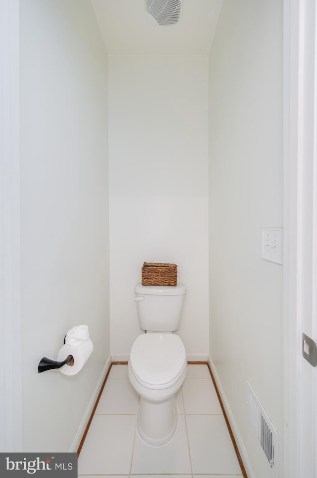 109 Manila Pl, Stephenson, VA 22656 - bathroom with baseboards, toilet, and tile patterned flooring