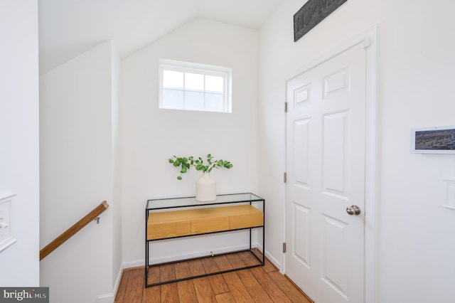 109 Manila Pl, Stephenson, VA 22656 - doorway with wood finished floors, vaulted ceiling, and baseboards