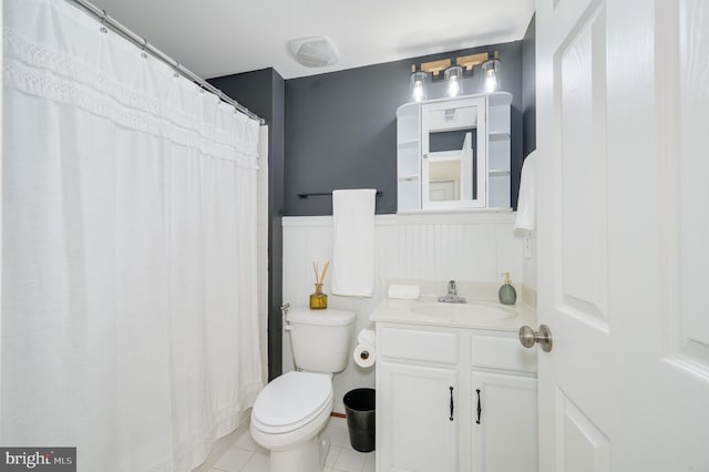 109 Manila Pl, Stephenson, VA 22656 - bathroom with wainscoting, vanity, tile patterned flooring, toilet, and a shower with shower curtain