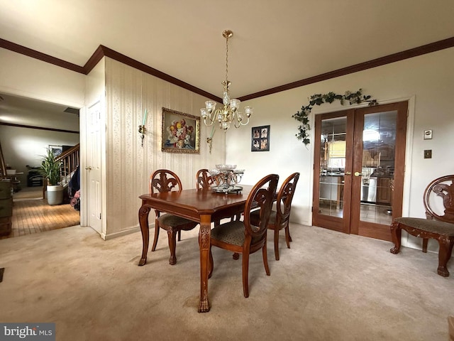 11 Morlatton Rd, Douglassville, PA 19518 - dining room with french doors, ornamental molding, light colored carpet, and a chandelier