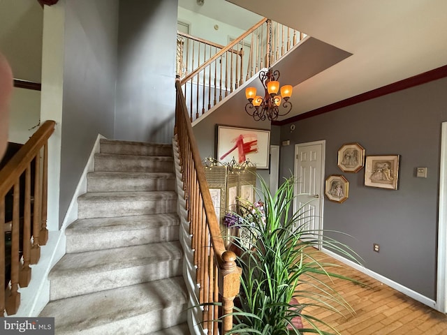 11 Morlatton Rd, Douglassville, PA 19518 - stairs with wood finished floors, baseboards, and a chandelier