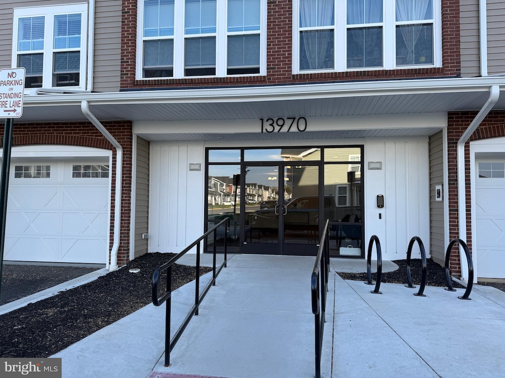 13970 Englefield Dr Unit 207, Woodbridge, VA 22193 - entrance to property with brick siding