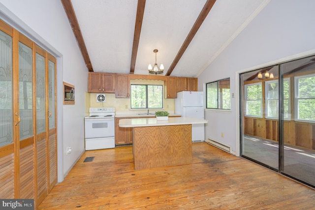 kitchen with white appliances, light wood-style floors, baseboard heating, a chandelier, and a sink