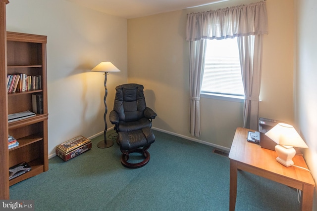 sitting room featuring carpet floors, baseboards, and visible vents