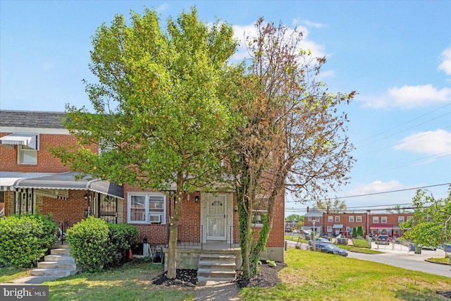 577 Lucia Ave, Baltimore, MD 21229 - multi unit property with brick siding and a front lawn