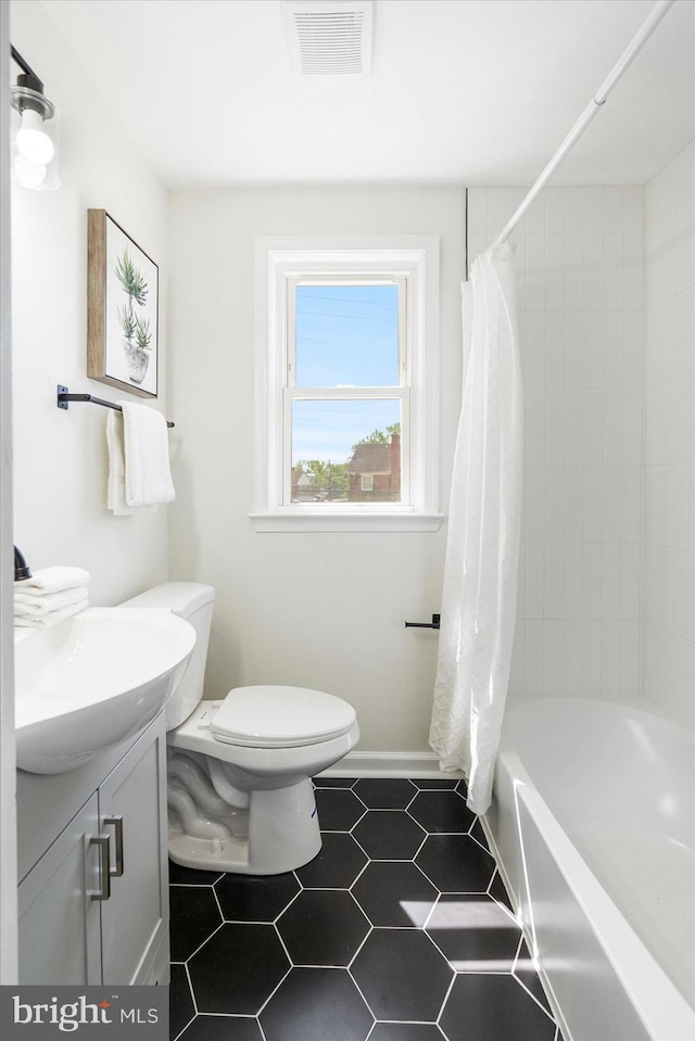 full bathroom with shower / bath combination with curtain, visible vents, tile patterned floors, vanity, and toilet