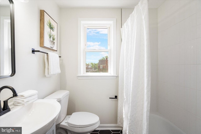 577 Lucia Ave, Baltimore, MD 21229 - bathroom featuring tile patterned floors, baseboards, vanity, and toilet
