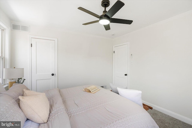 577 Lucia Ave, Baltimore, MD 21229 - carpeted bedroom with baseboards, ceiling fan, and visible vents