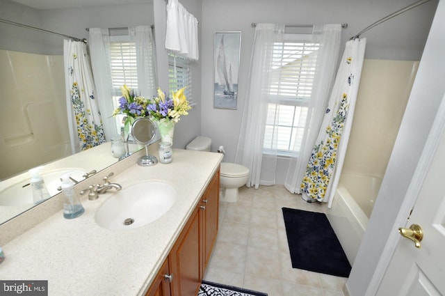 bathroom with toilet, tile patterned floors, shower / bath combo, and vanity
