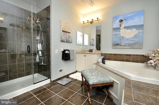 full bath featuring visible vents, tile patterned flooring, vanity, a bath, and a stall shower