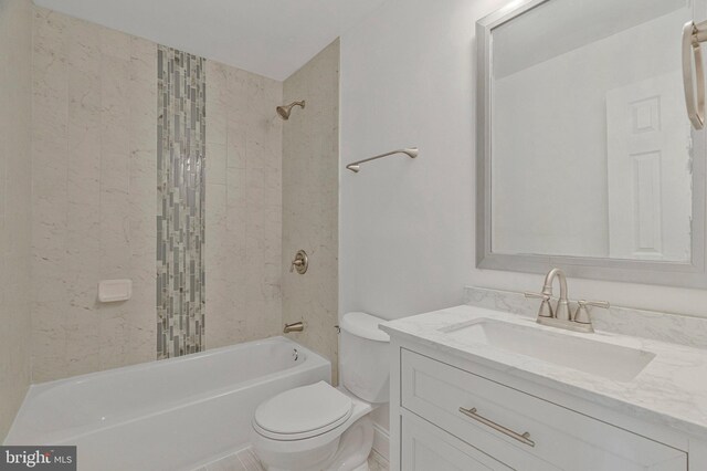 full bath with vanity, toilet, and bathtub / shower combination