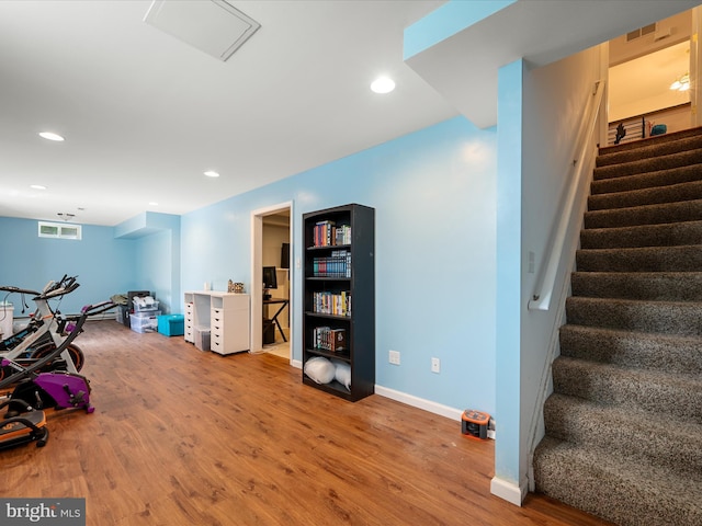 628 Allegheny Cir, Woodstock, VA 22664 - exercise area with wood finished floors, recessed lighting, and baseboards