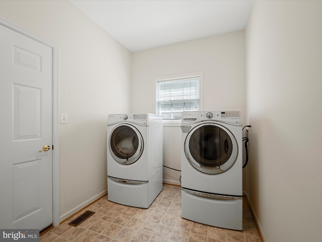 628 Allegheny Cir, Woodstock, VA 22664 - washroom featuring washing machine and dryer and baseboards