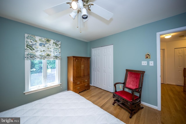 3022 Cascade Dr, Abingdon, MD 21009 - bedroom with wood finished floors, a closet, baseboards, and ceiling fan