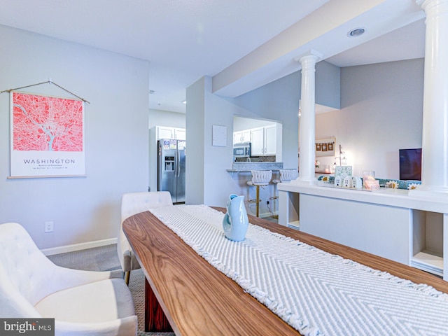 1720 Lake Shore Crest Dr Unit 35, Reston, VA 20190 - dining space with baseboards and decorative columns