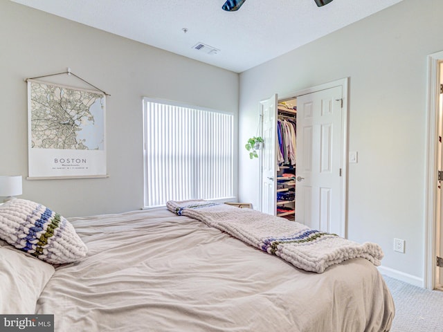 1720 Lake Shore Crest Dr Unit 35, Reston, VA 20190 - bedroom with a closet, carpet, baseboards, visible vents, and a walk in closet