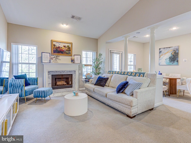 1720 Lake Shore Crest Dr Unit 35, Reston, VA 20190 - carpeted living area with a healthy amount of sunlight, lofted ceiling, ornate columns, and visible vents