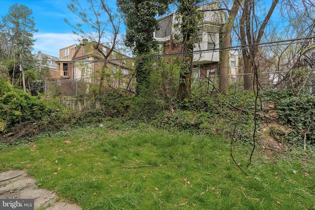 view of yard with fence