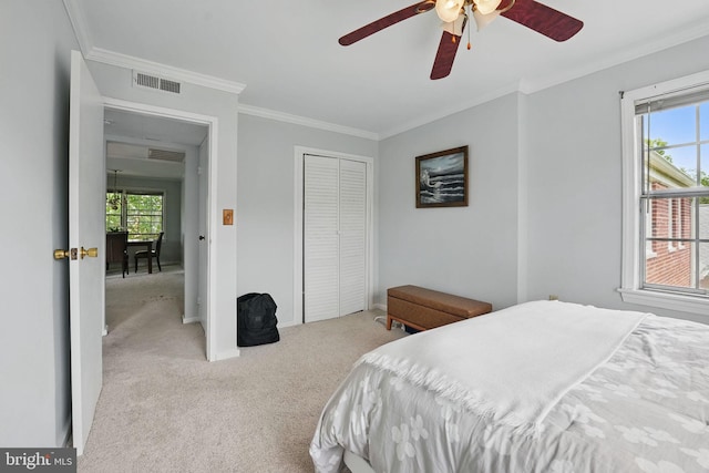 6618 Boulevard Vw Unit C1, Alexandria, VA 22307 - carpeted bedroom with crown molding, multiple windows, a closet, and ceiling fan