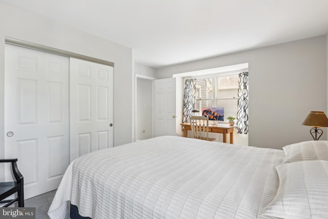 carpeted bedroom with a closet