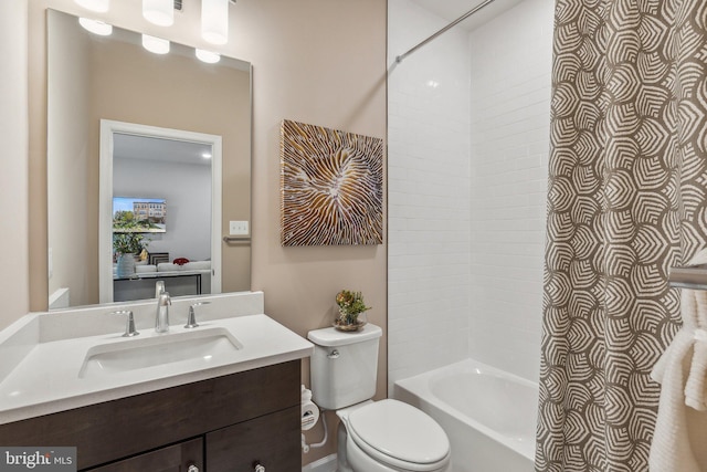 full bath featuring vanity, shower / bath combination, and toilet