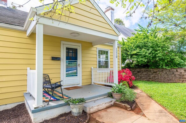 1210 Meriwether St, Charlottesville, VA 22902 - entrance to property featuring covered porch and a chimney