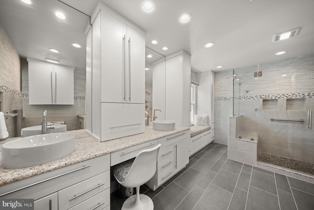 3422 Silver Maple Pl, Falls Church, VA 22042 - bathroom featuring a shower stall, recessed lighting, double vanity, and tile patterned flooring