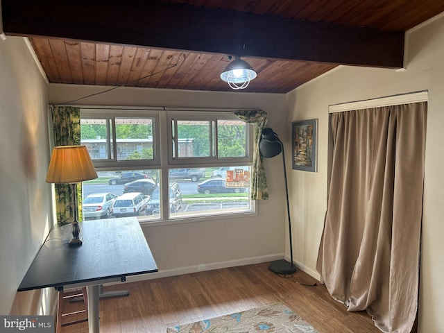 7401 18th Ave Unit 208, Hyattsville, MD 20783 - unfurnished dining area with wooden ceiling, baseboards, beamed ceiling, and wood finished floors