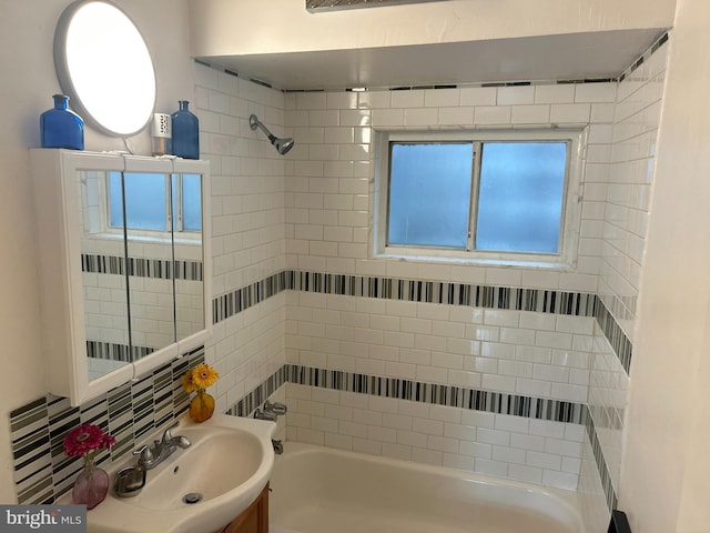 7401 18th Ave Unit 208, Hyattsville, MD 20783 - bathroom featuring shower / tub combination, vanity, a wealth of natural light, and tasteful backsplash