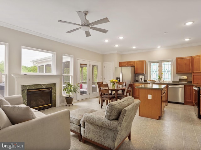 29 Norwood Ln, Fredericksburg, VA 22406 - living room featuring crown molding, a ceiling fan, recessed lighting, and a premium fireplace