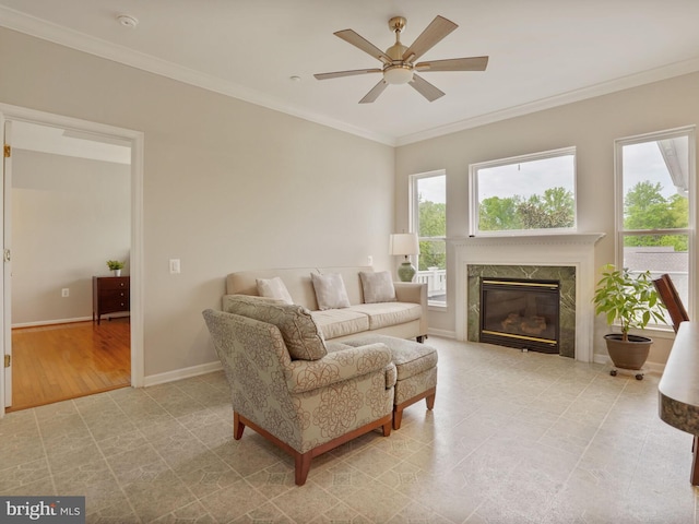29 Norwood Ln, Fredericksburg, VA 22406 - living area featuring a high end fireplace, baseboards, ornamental molding, and a ceiling fan