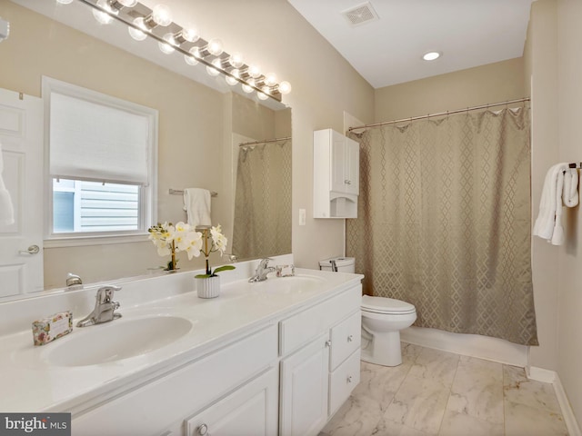 29 Norwood Ln, Fredericksburg, VA 22406 - full bathroom featuring a sink, marble finish floor, toilet, and visible vents